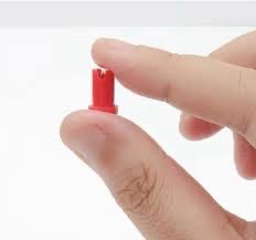 Tapón para adhesivo